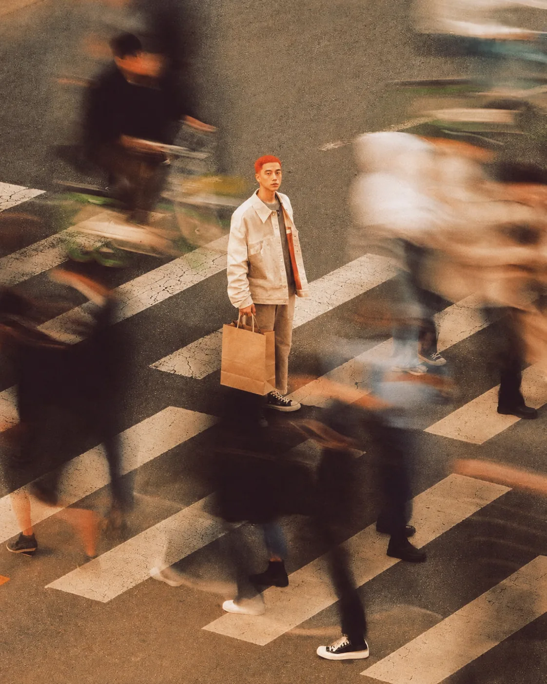 A busy city street full of people, the demand you can't see