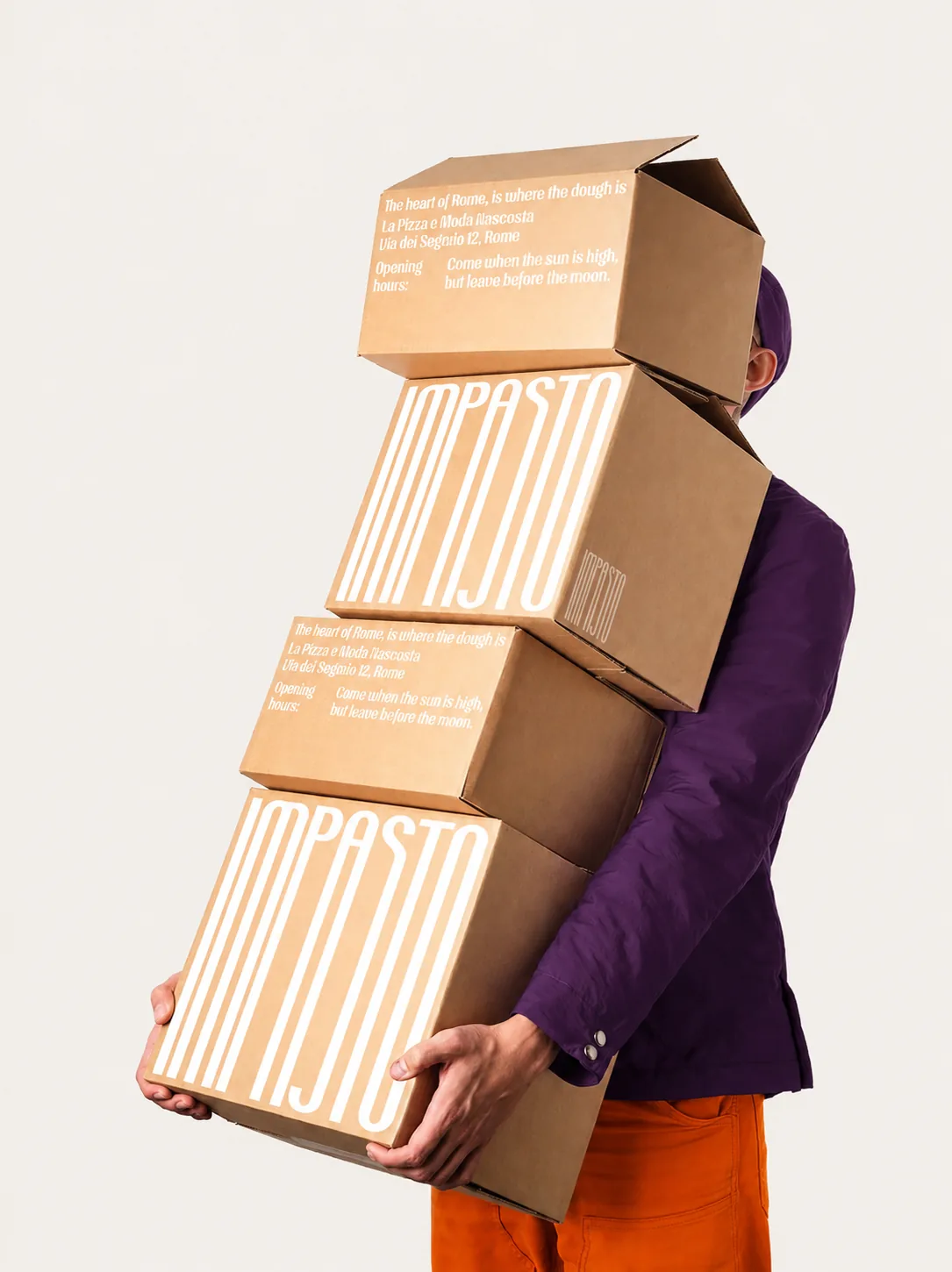 A delivery being handed to a happy customer at her door